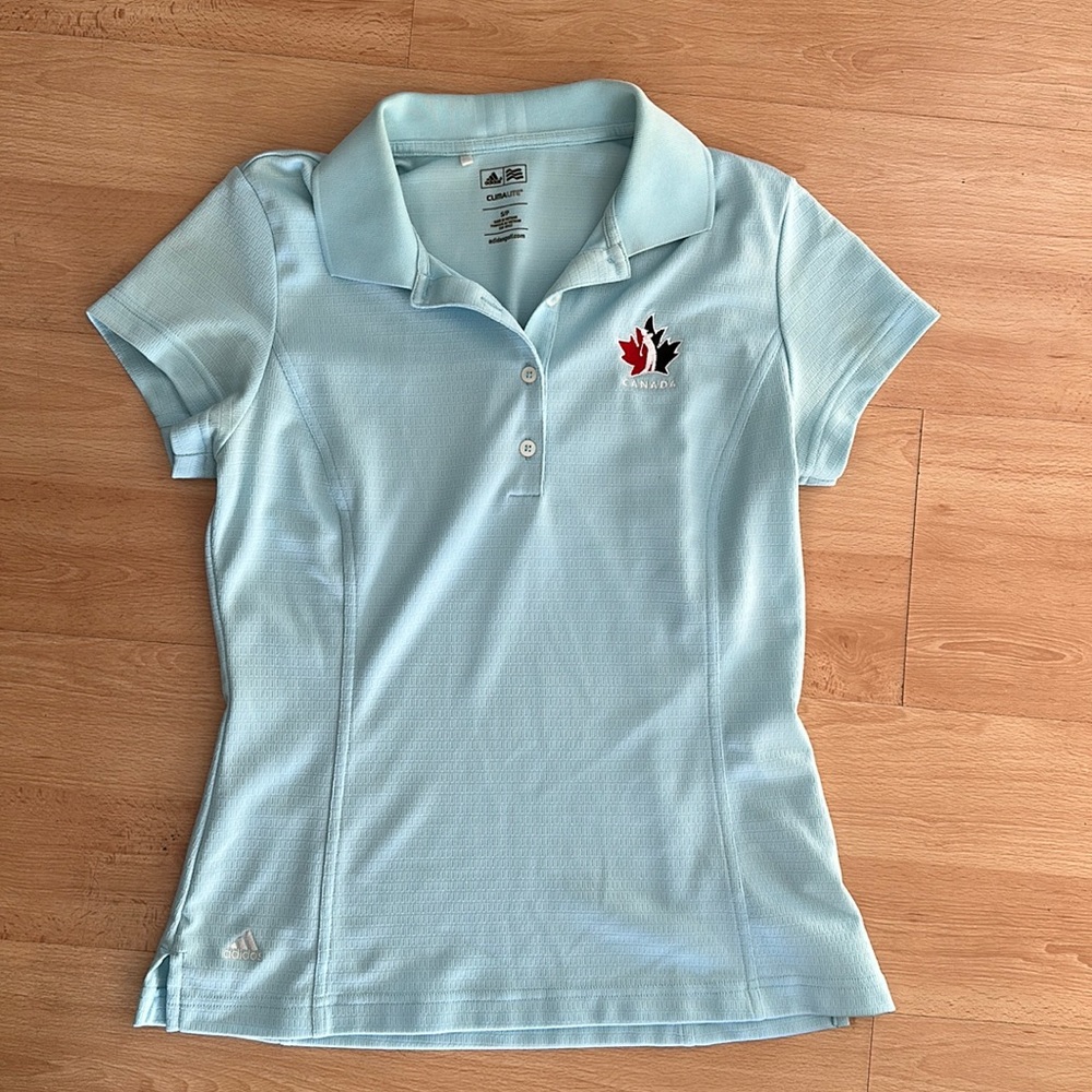 Baby blue team Canada branded Adida golf polo